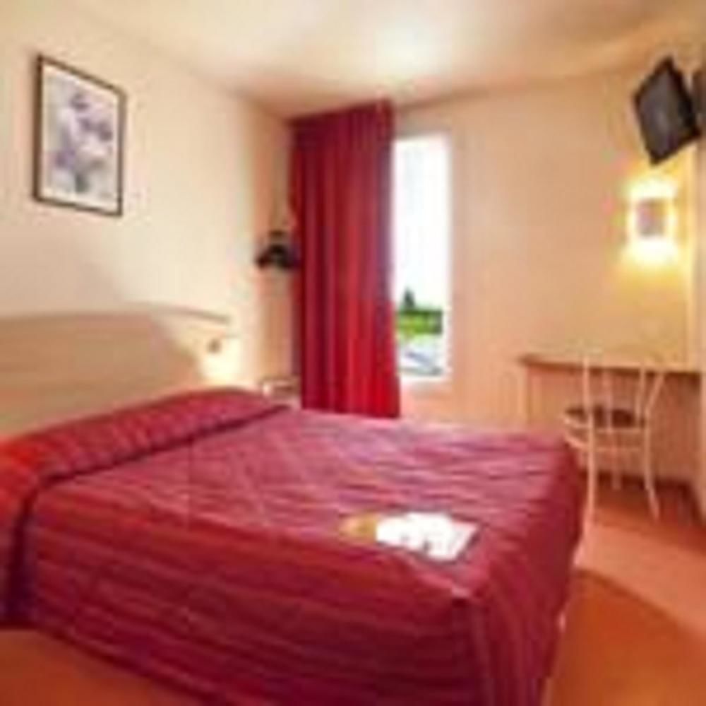 Premiere Classe Évreux Dış mekan fotoğraf A typical room at a hotel